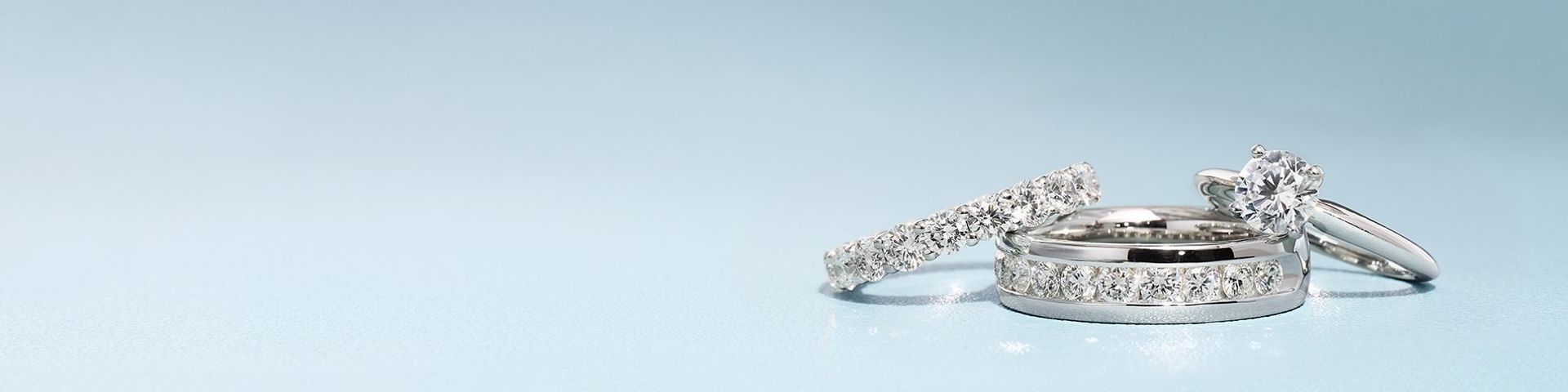 lab-grown eternity ring lying flat on light gray background